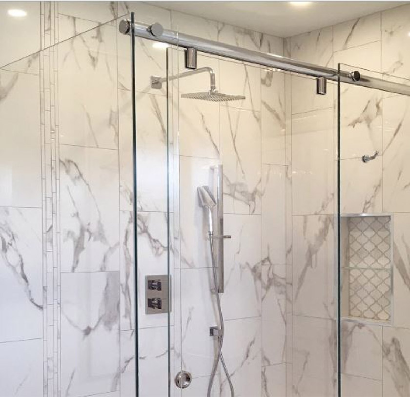 Glass shower screen with sliding doors