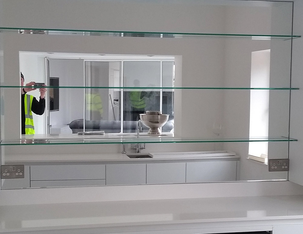 glass shelves with mirror back
