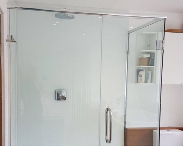 glass shower screen with stainless steel pull handle
