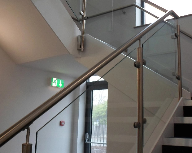 Glass balustrade with stainless steel banister and posts