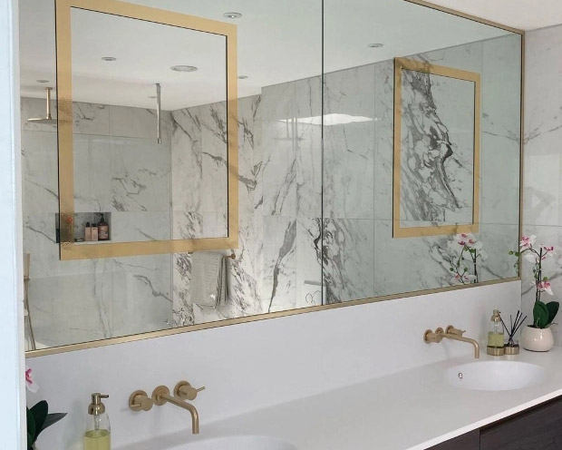 Bathroom mirrors with inner and outer gold frames