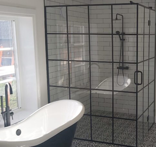 Glass shower screen box made from squares with black frames
