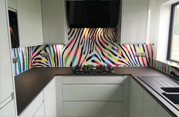 Zebra print glass splashback above kitchen countertop